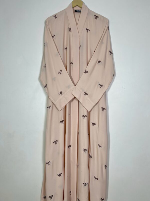 Elegant Light Pink Abaya with Bow Embroidery – Modest Fashion for Women