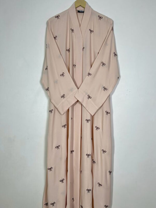 Elegant Light Pink Abaya with Bow Embroidery – Modest Fashion for Women
